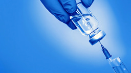 Impact of the aqueous corrosion induced alteration layer on mechanical properties of pharmaceutical glasses