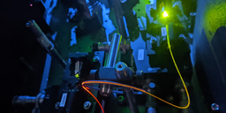 A decade-long journey to stimulate Hawking radiation with a single photon