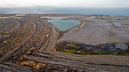 Wind-blown lake mud records 10 000 years of Arctic storminess   