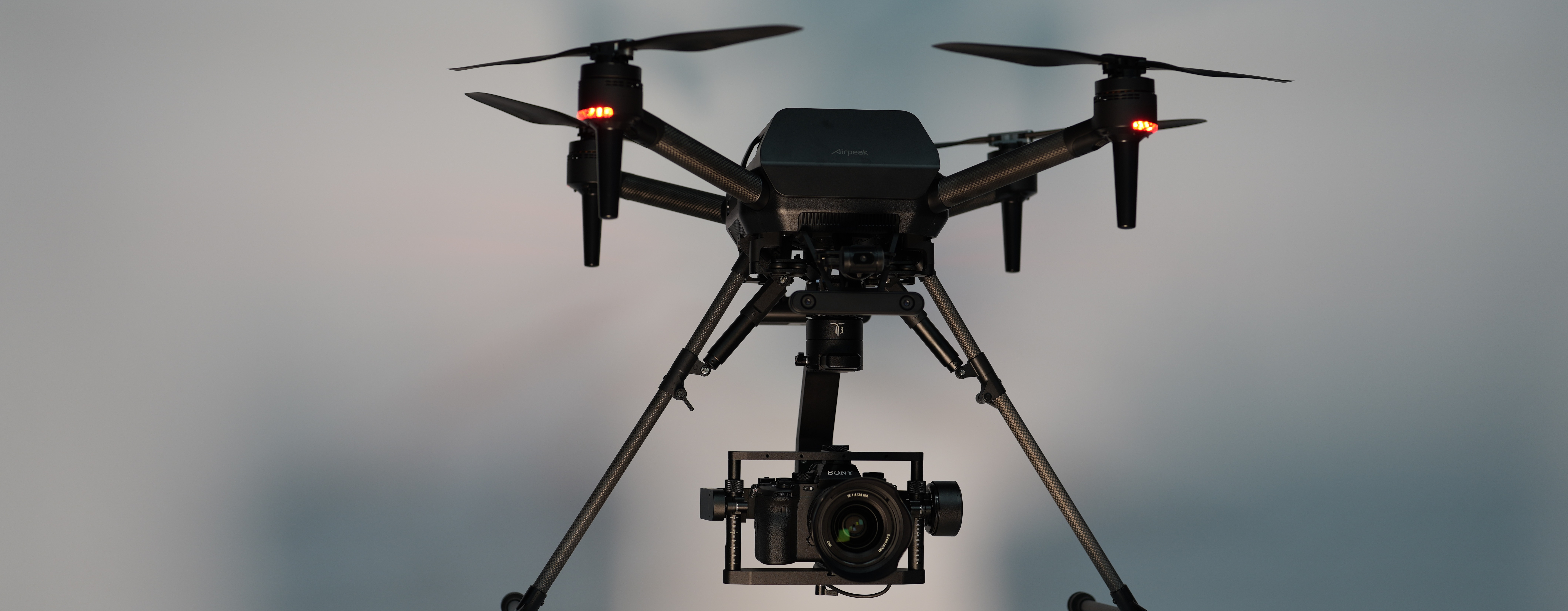 Elevating Autonomous Health Assessment to Combat Aging Infrastructures:  Aerial Drone Photography Unveils Millimeter-Scale Bridge Deflections