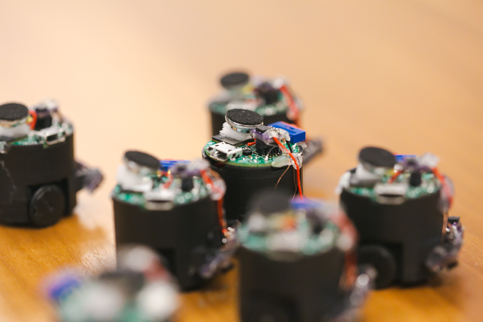 Acoustic Swarms: Robotic Swarms that Cooperatively Navigate using Sound
