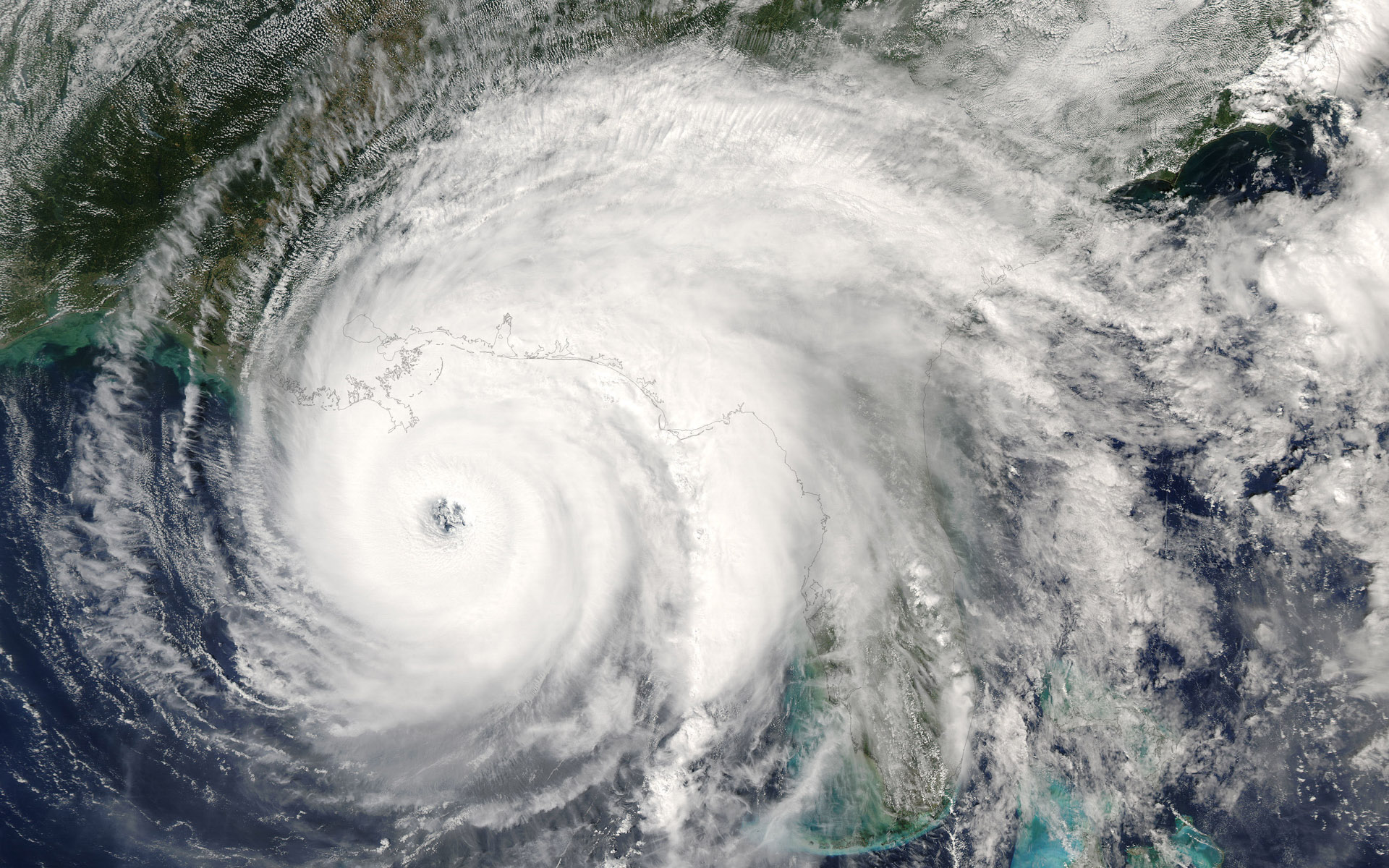 Would artificially cooling the ocean ahead of a land-destined tropical cyclone be a practical mitigation strategy?