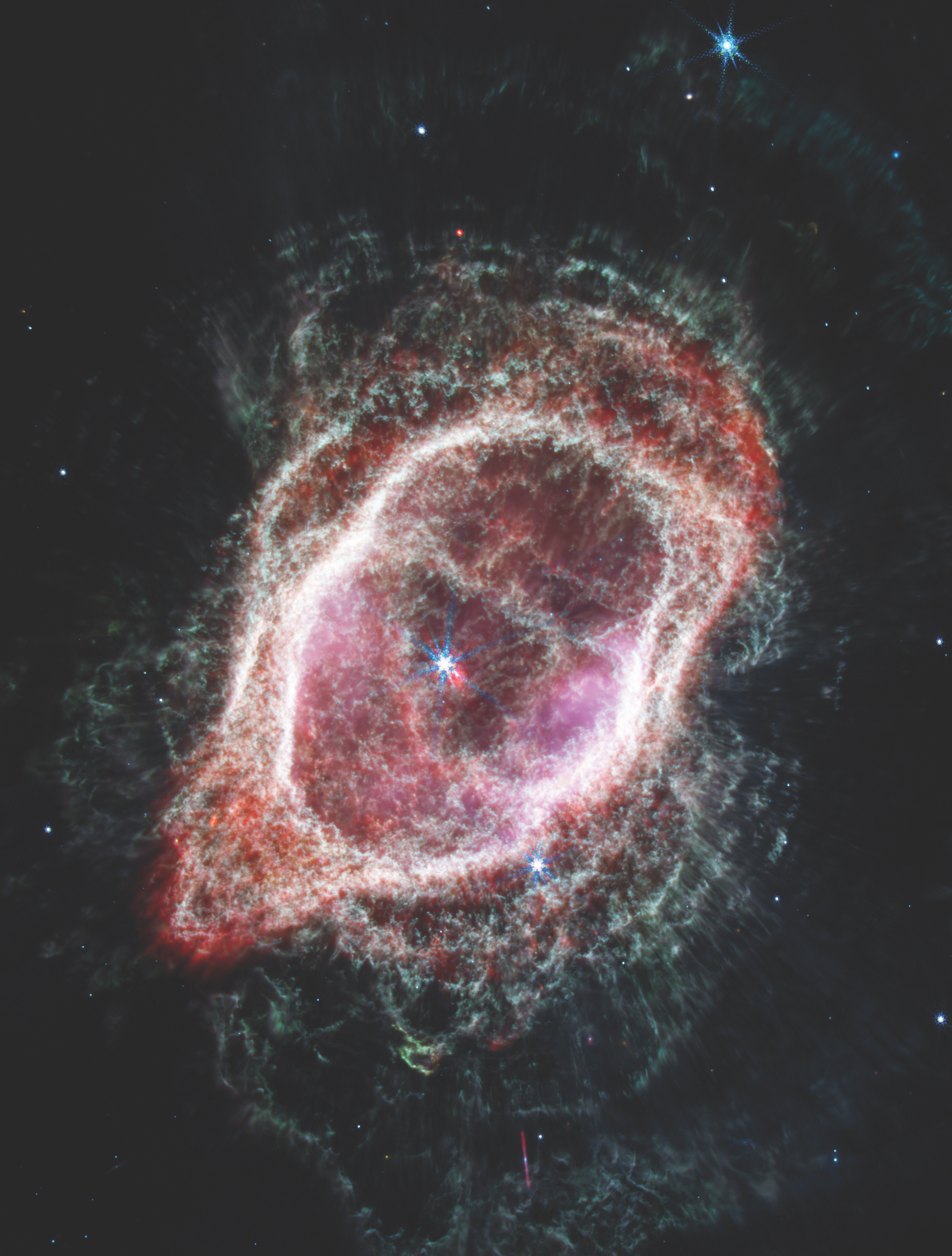 A firmament of astronomers crowd over the JWST image of the Southern Ring nebula